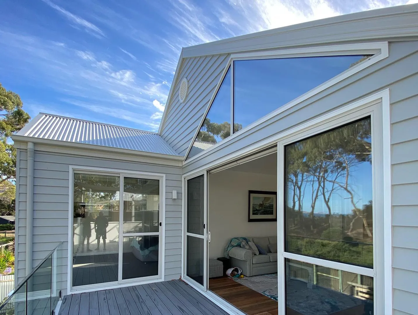 Modern house with large windows and deck